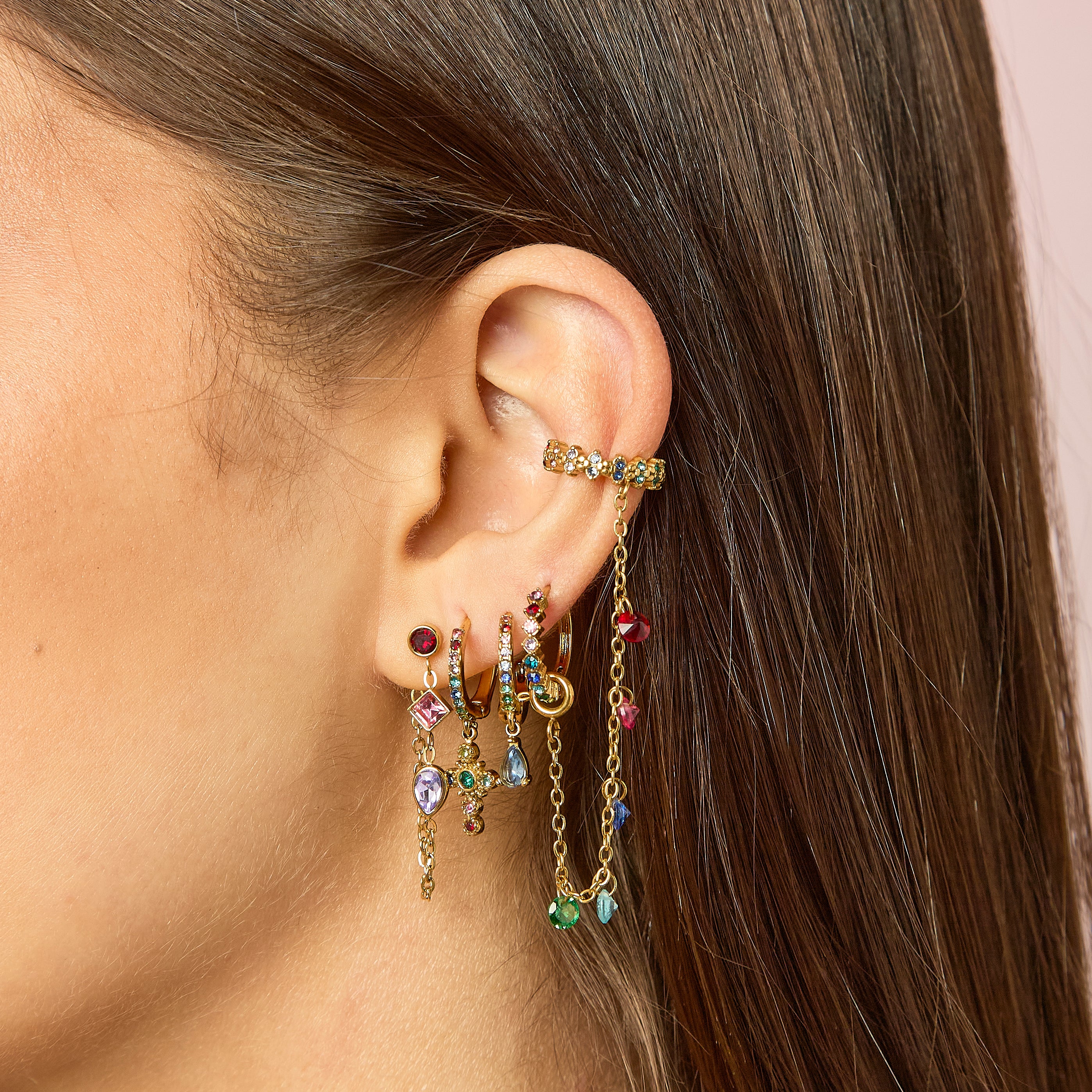 Isabella Gold Rainbow Cross Huggie Earrings - Image 3